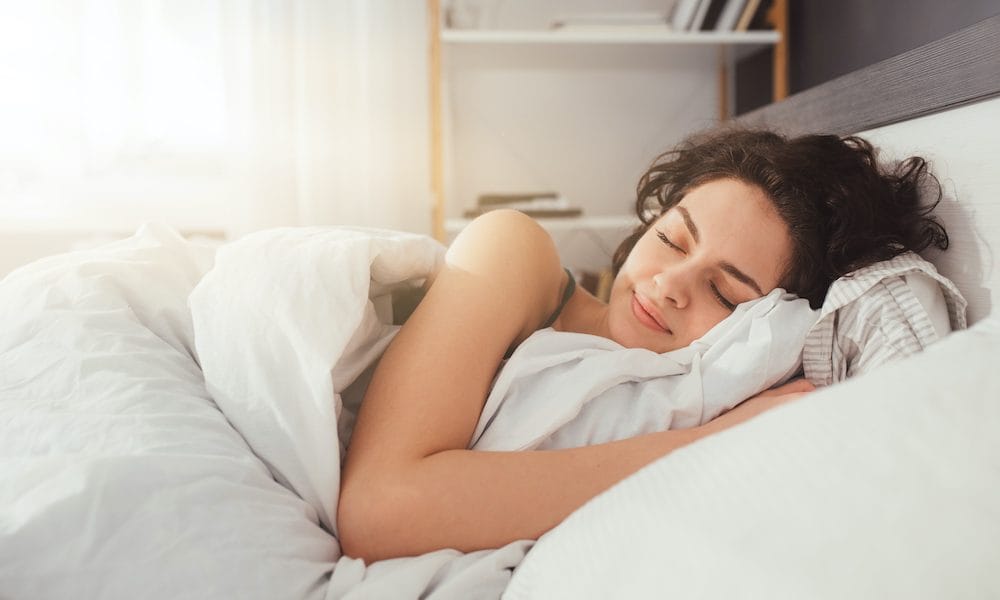 Feeling,Calmness.,Sleepy,Female,Keeping,Eyes,Closed,While,Dreaming,About How a good night’s sleep increases resilience