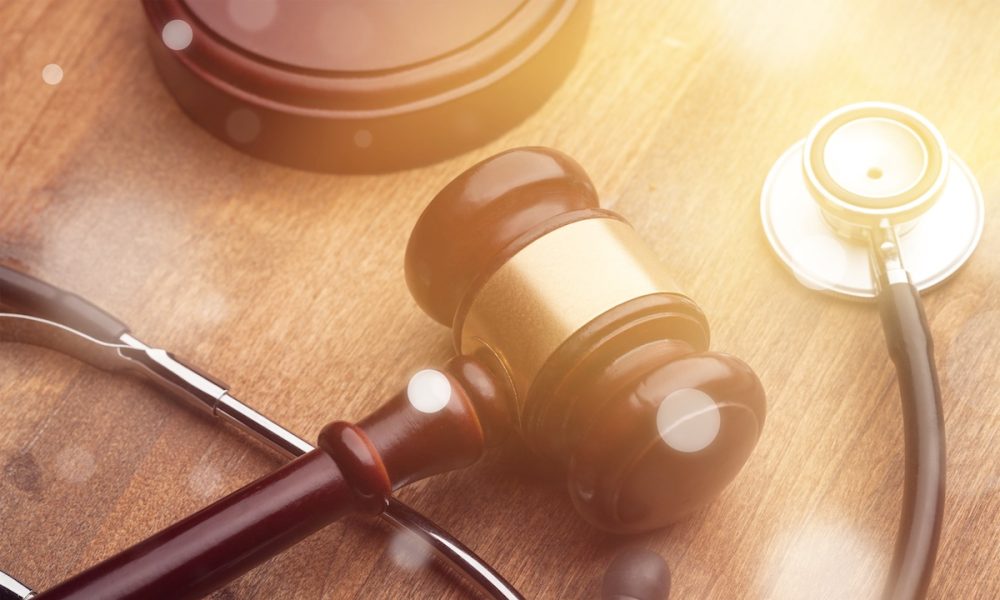 Stethoscope and judgement hammer. APIL warns increasing court fees may price out injured claimants