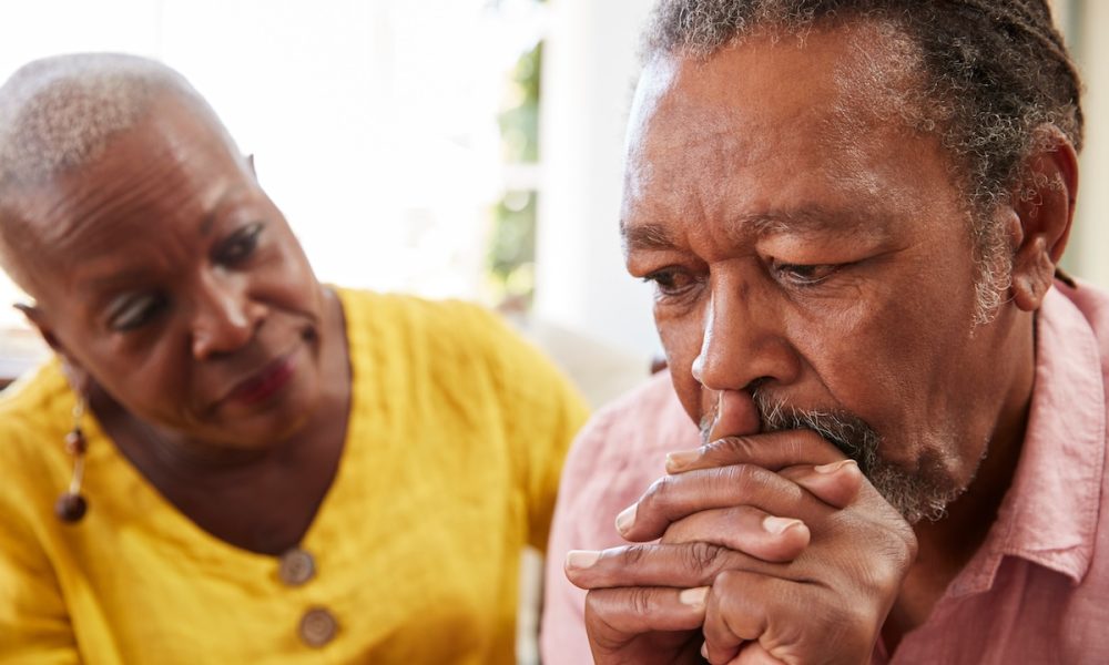 Senior Woman Comforting Man With Depression At Home Telehealth nurses can help lower blood pressure in stroke survivors