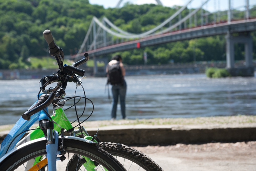 bicycle-background-bridge-river-girl-riverside-nearby-her-bicycle Man to cycle across UK without sleep in aid of MS Society